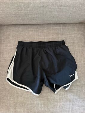 Nike kids Black Athletic Shorts with White Trim and Swoosh